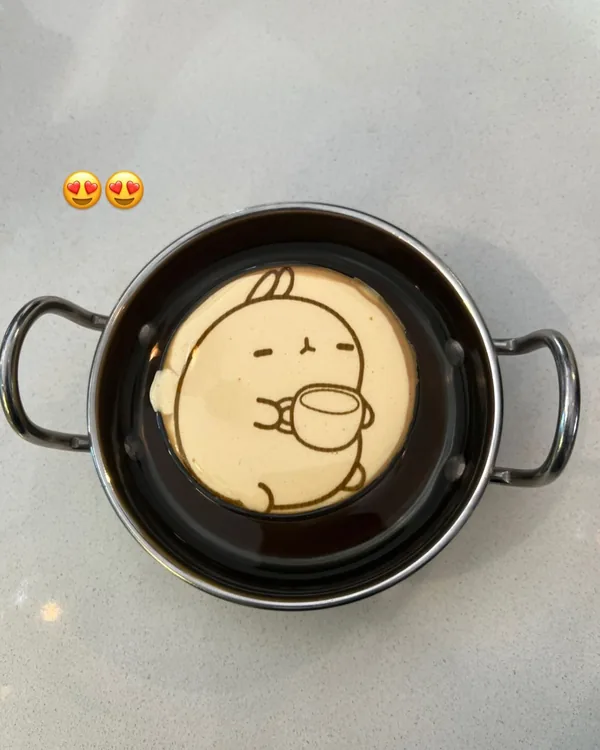 An egg coffee with a little bunny drawn in the cream